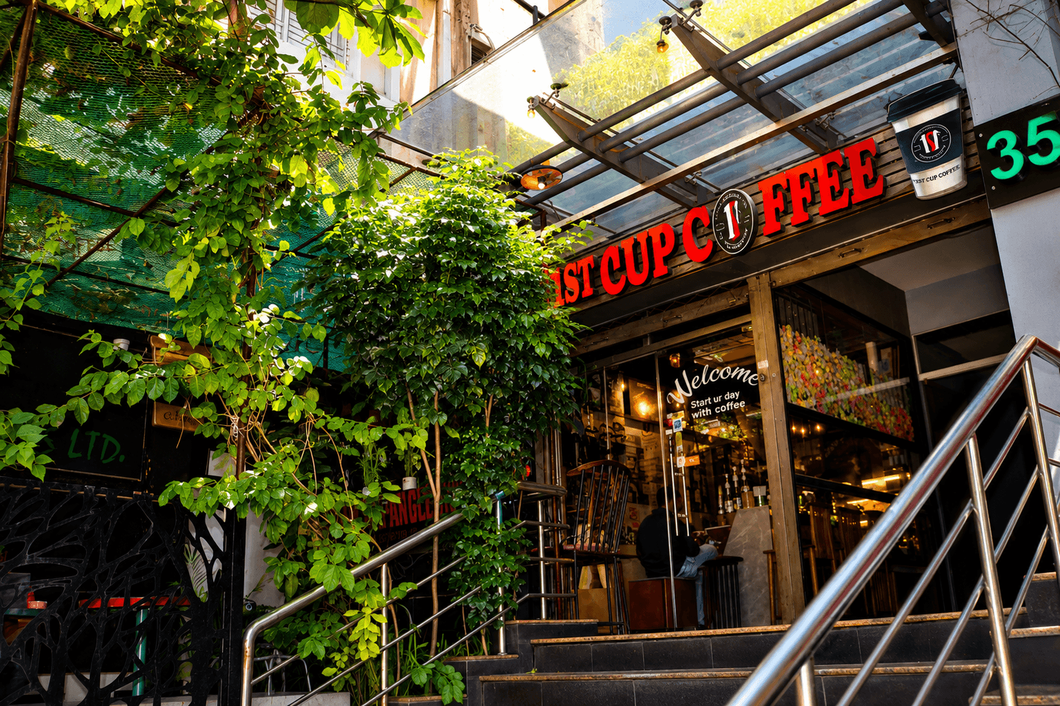 1st Cup Coffee shop cozy interior with warm ambient lighting